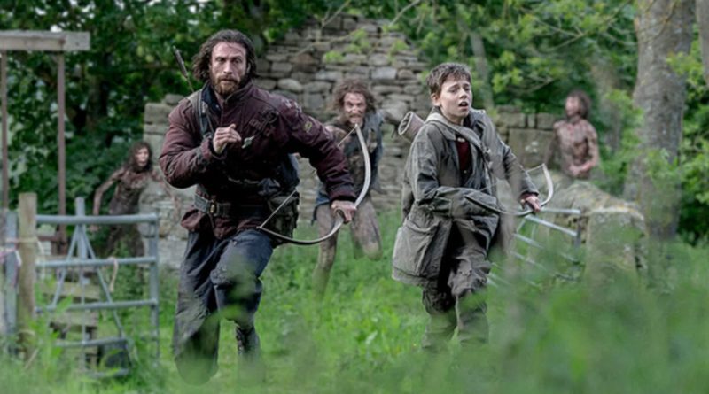 Aaron Taylor-Johnson and Alfie Williams in "28 Years Later" (2025)